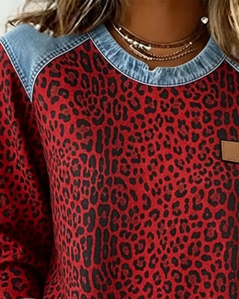 Suéter de denim patchwork con estampado de leopardo Lena
