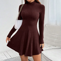 Emma – El eterno vestido acampanado de cuello alto