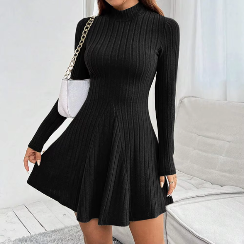 Emma – El eterno vestido acampanado de cuello alto