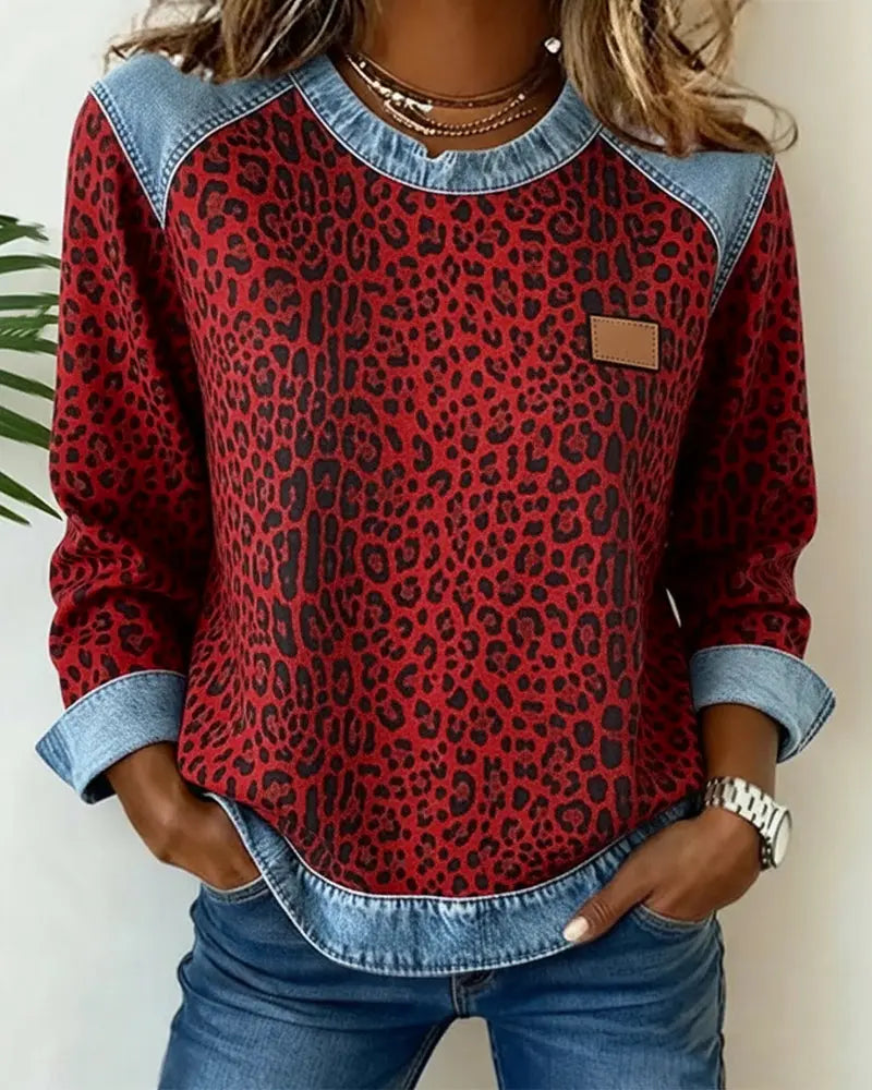 Suéter de denim patchwork con estampado de leopardo Lena